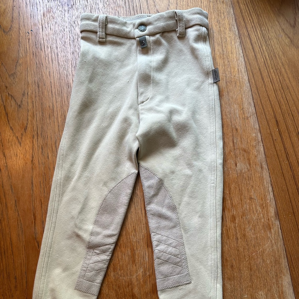 Kids size small horseback riding leggings.